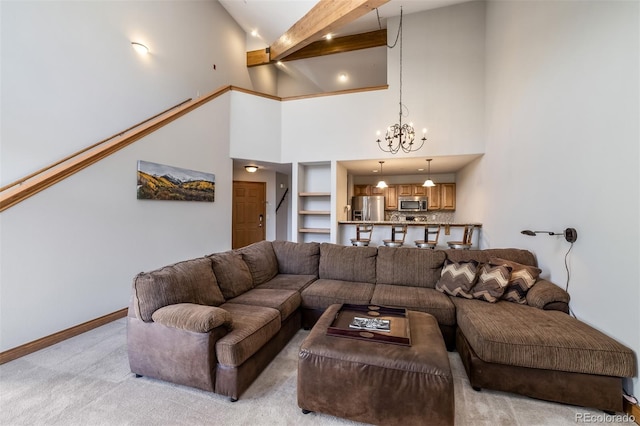 living room with an inviting chandelier, light carpet, built in features, beam ceiling, and high vaulted ceiling