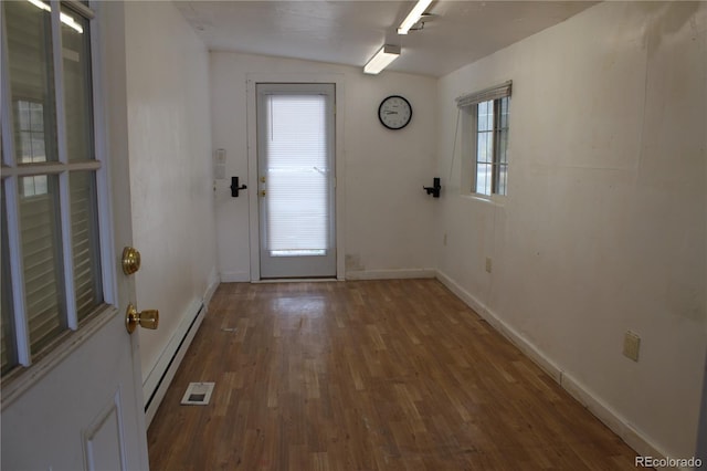 1692 US Highway 24, Leadville, CO 80461 - doorway featuring baseboard heating, wood finished floors, plenty of natural light, and baseboards