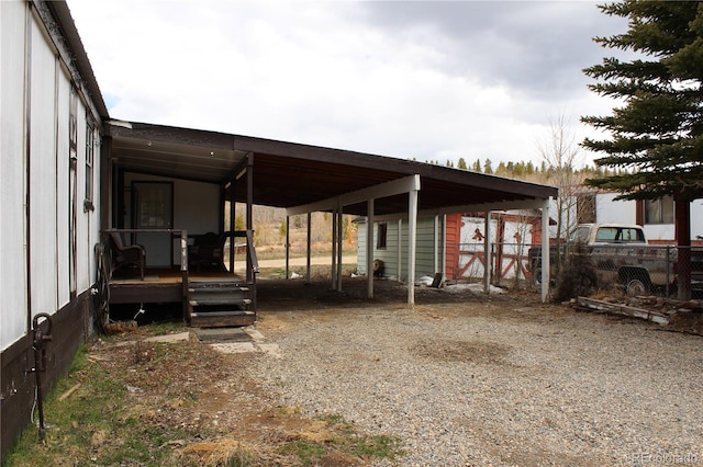 1692 US Highway 24, Leadville, CO 80461 - back of property featuring fence, a carport, and gravel driveway