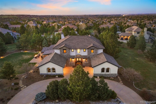 aerial view at dusk with a residential view
