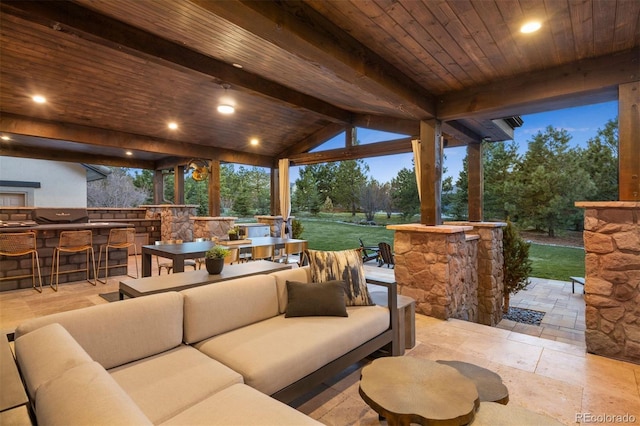 view of patio / terrace featuring an outdoor living space, outdoor dry bar, and area for grilling