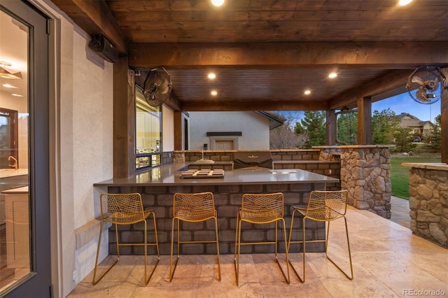 view of patio with outdoor wet bar