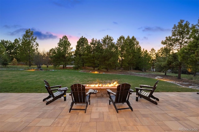 view of patio with an outdoor fire pit