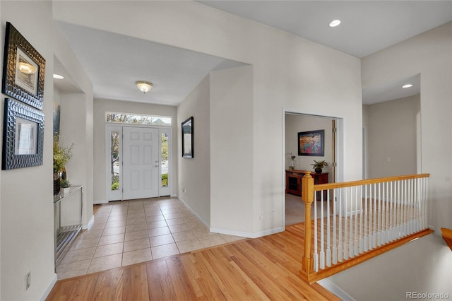 20591 E Weaver Ave, Aurora, CO 80016 - foyer entrance featuring light tile patterned flooring and recessed lighting