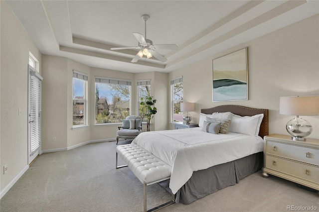 20591 E Weaver Ave, Aurora, CO 80016 - bedroom with carpet, a raised ceiling, and ceiling fan