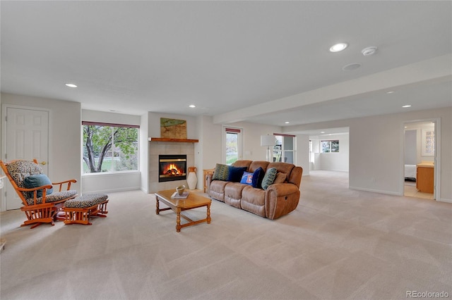 20591 E Weaver Ave, Aurora, CO 80016 - living room featuring light carpet, recessed lighting, plenty of natural light, and a tile fireplace