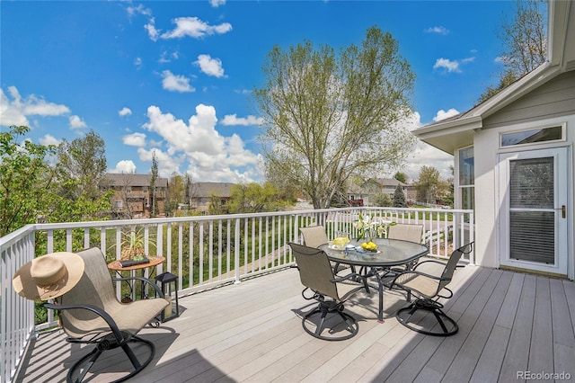 20591 E Weaver Ave, Aurora, CO 80016 - wooden deck featuring outdoor dining space