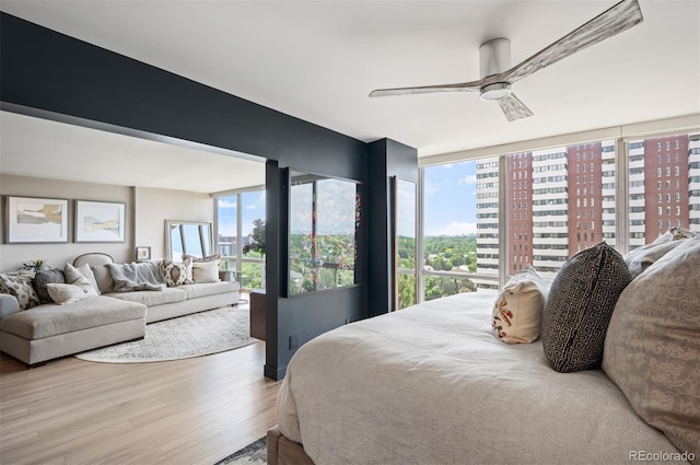 3100 E Cherry Creek S Drive 1403, Denver, CO 80209 - bedroom featuring wood finished floors and ceiling fan