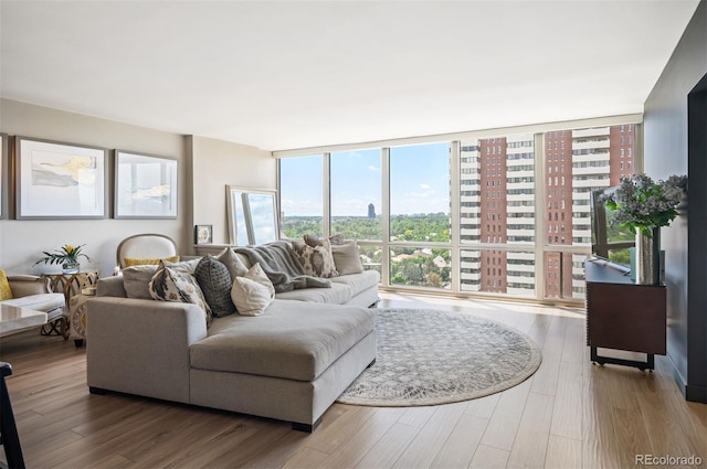 3100 E Cherry Creek S Drive 1403, Denver, CO 80209 - living area with floor to ceiling windows and wood finished floors