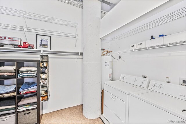 2000 Arapahoe St Unit 503, Denver, CO 80205 - laundry room with separate washer and dryer and light carpet