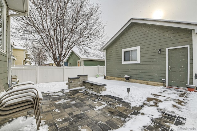 view of snow covered patio