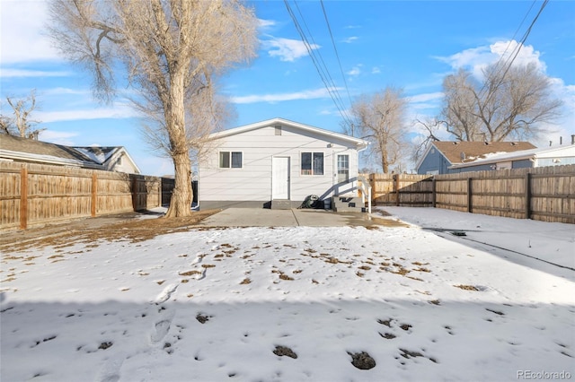 view of snow covered property