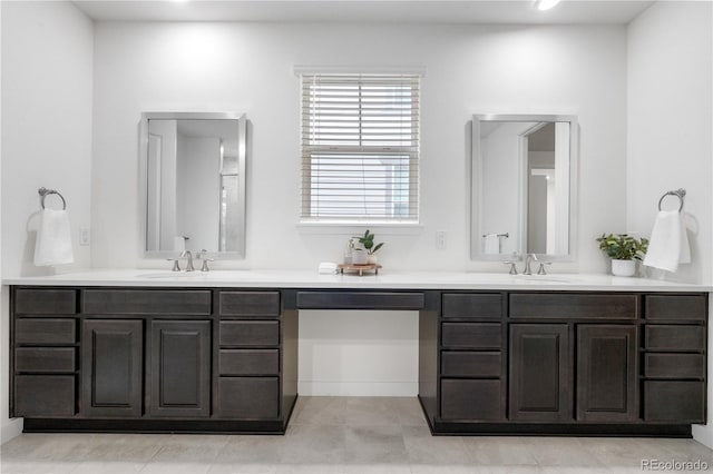 8814 S Winnipeg Ct, Aurora, CO 80016 - full bathroom featuring double vanity and tile patterned flooring