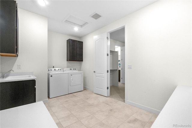 8814 S Winnipeg Ct, Aurora, CO 80016 - washroom with cabinet space, attic access, and washing machine and clothes dryer