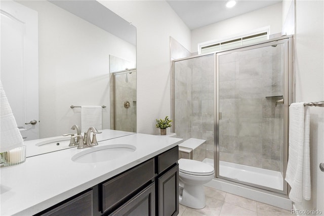 8814 S Winnipeg Ct, Aurora, CO 80016 - bathroom featuring vanity, a shower stall, and tile patterned flooring