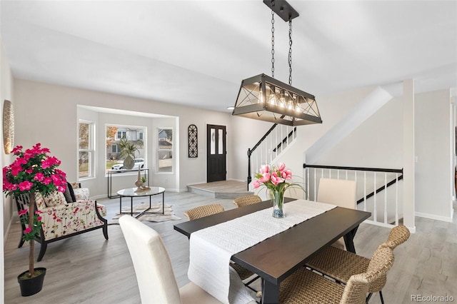 dining room with light hardwood / wood-style flooring