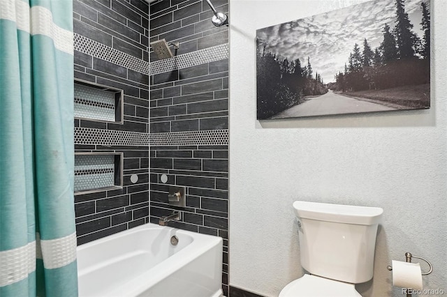 bathroom featuring toilet and shower / bath combination with curtain