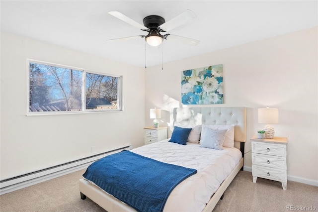 bedroom with light carpet, a baseboard radiator, and ceiling fan