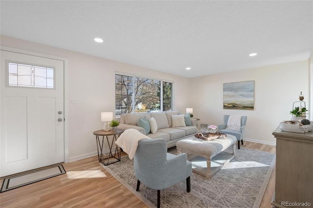 living room with light hardwood / wood-style flooring