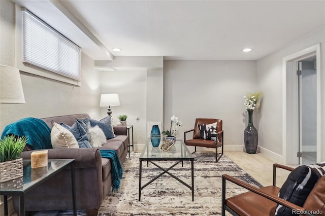 living room with carpet floors, baseboards, and recessed lighting