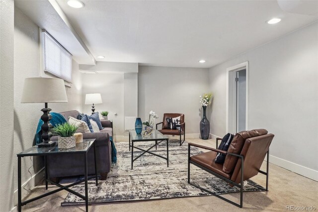 living area with baseboards, carpet, and recessed lighting