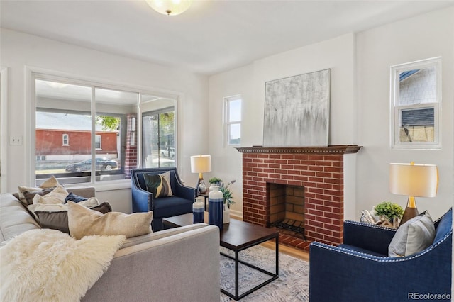 3527 W 44th Ave, Denver, CO 80211 - living room featuring wood finished floors and a fireplace