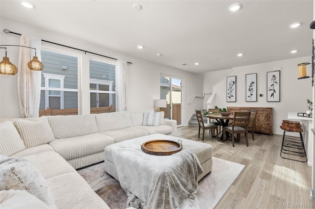 living room with light hardwood / wood-style floors