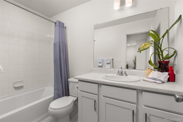 full bathroom featuring vanity, toilet, and shower / bath combo