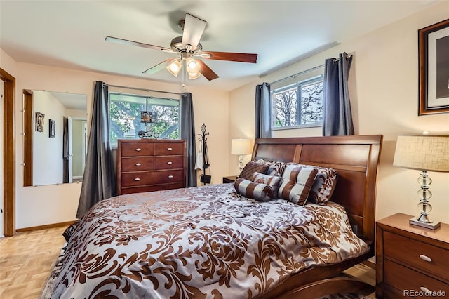 6436 Otis St, Arvada, CO 80003 - bedroom featuring multiple windows and ceiling fan