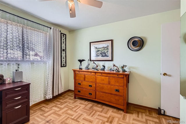 6436 Otis St, Arvada, CO 80003 - bedroom with baseboards and ceiling fan