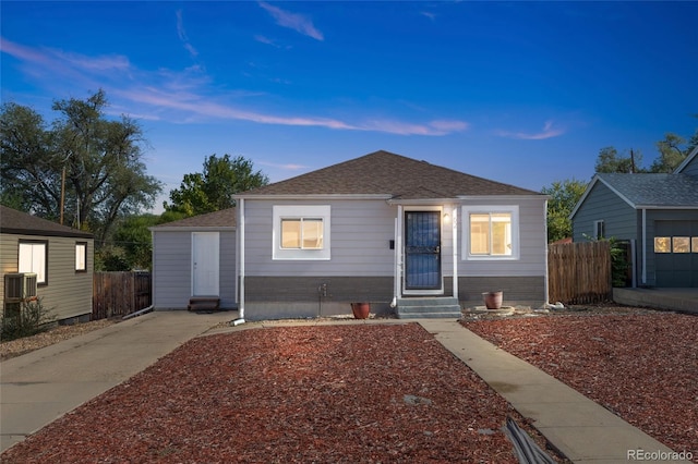 view of front of home featuring cooling unit