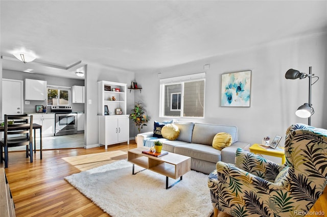 living room featuring light wood-type flooring