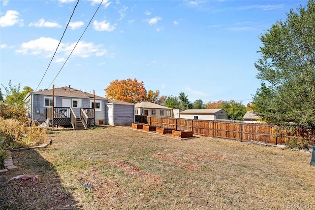 view of yard featuring a wooden deck