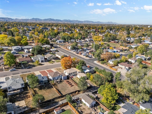 birds eye view of property with a mountain view