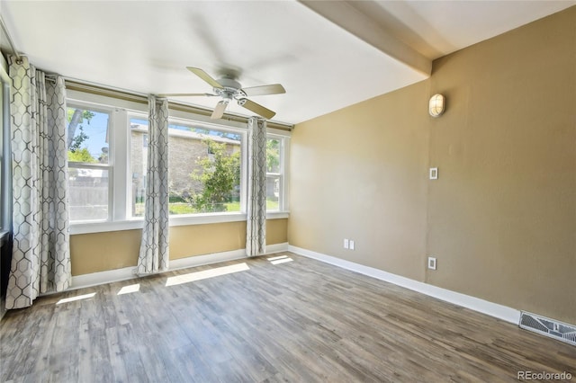 180 S Lamar St, Lakewood, CO 80226 - spare room featuring ceiling fan, wood finished floors, and baseboards