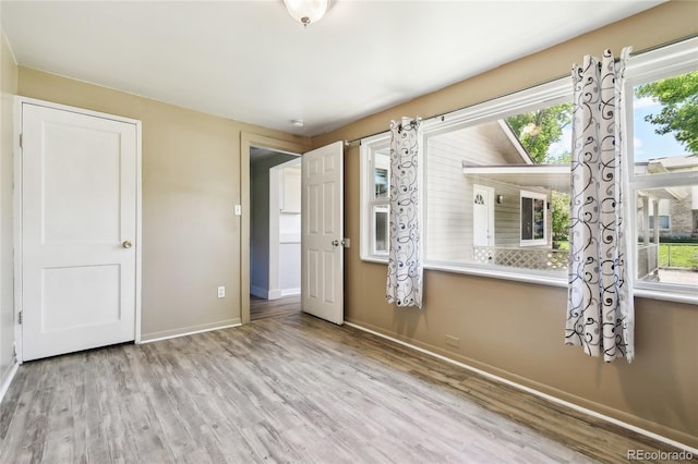 180 S Lamar St, Lakewood, CO 80226 - entryway with wood finished floors and baseboards