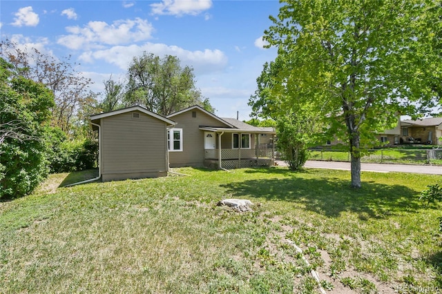 180 S Lamar St, Lakewood, CO 80226 - view of front of home featuring a front yard