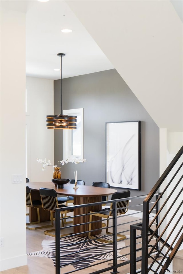 8230 W Tennessee Ct, Lakewood, CO 80226 - dining room featuring wood finished floors, stairs, recessed lighting, and a chandelier