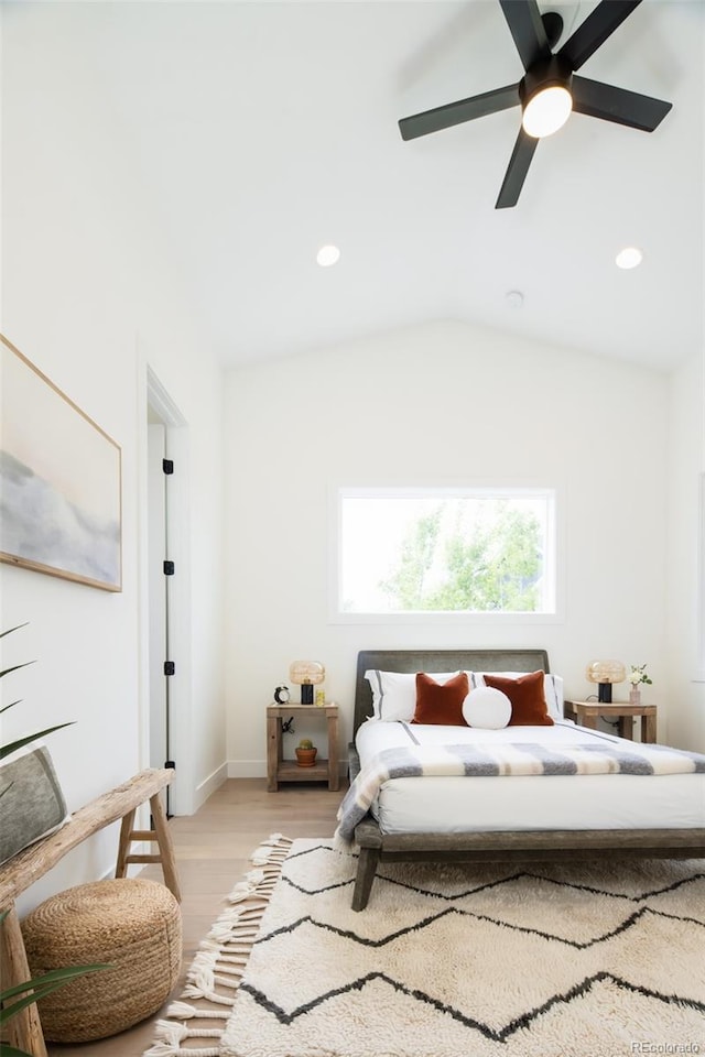 8230 W Tennessee Ct, Lakewood, CO 80226 - bedroom featuring light wood-style flooring, vaulted ceiling, recessed lighting, a ceiling fan, and baseboards