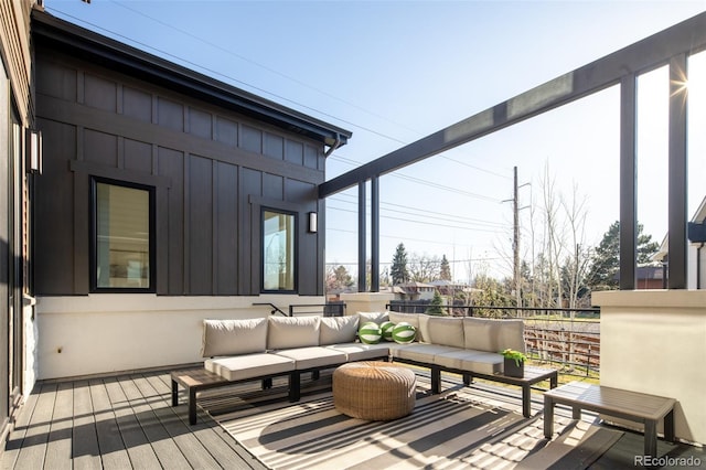 8230 W Tennessee Ct, Lakewood, CO 80226 - deck featuring an outdoor hangout area