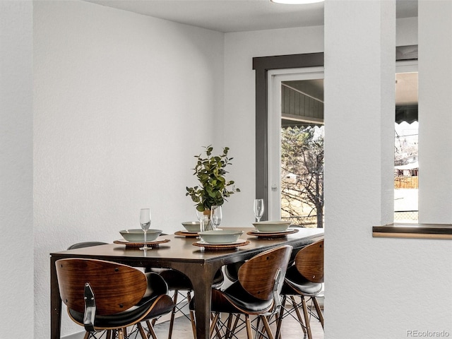 dining area featuring wood finished floors