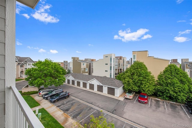 15700 E Jamison Dr Unit 3-307, Englewood, CO 80112 - view of property featuring uncovered parking and a residential view