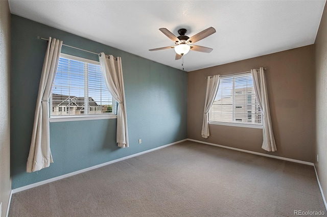 15700 E Jamison Dr Unit 3-307, Englewood, CO 80112 - carpeted empty room with healthy amount of natural light, a ceiling fan, and baseboards