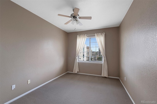 15700 E Jamison Dr Unit 3-307, Englewood, CO 80112 - unfurnished room featuring ceiling fan, baseboards, a textured wall, and carpet