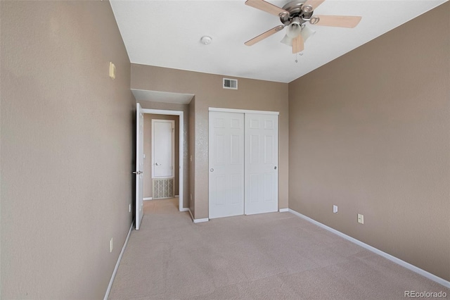 15700 E Jamison Dr Unit 3-307, Englewood, CO 80112 - unfurnished bedroom with light carpet, a closet, baseboards, and a ceiling fan