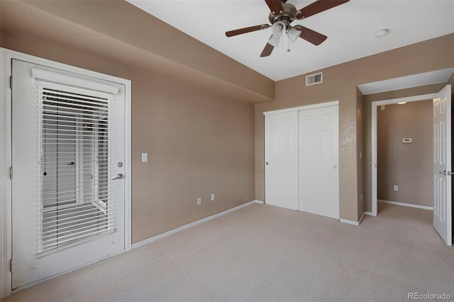 15700 E Jamison Dr Unit 3-307, Englewood, CO 80112 - unfurnished bedroom featuring light carpet, baseboards, a closet, a ceiling fan, and access to outside