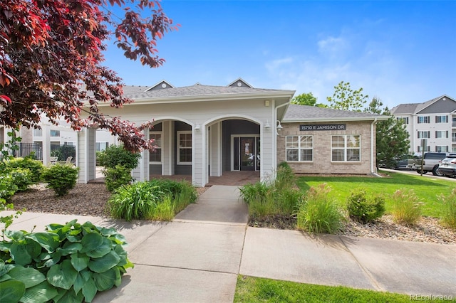 15700 E Jamison Dr Unit 3-307, Englewood, CO 80112 - view of front of property featuring a porch and a front yard