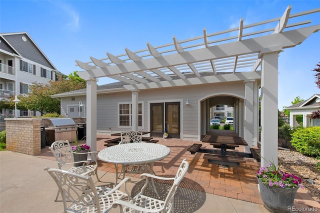 15700 E Jamison Dr Unit 3-307, Englewood, CO 80112 - view of patio featuring outdoor dining space and a pergola