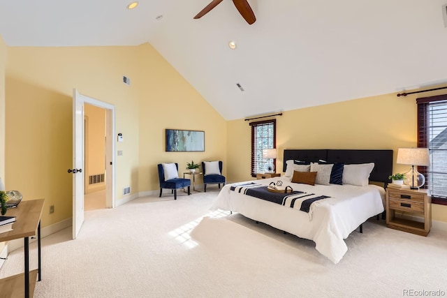 bedroom featuring ceiling fan, high vaulted ceiling, and light carpet