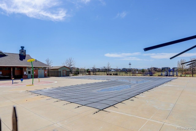 community pool featuring fence